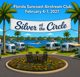 Airstreams in a half circle with a banner "Silver at the Circle"