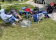 SEMAC Members gather around the fire